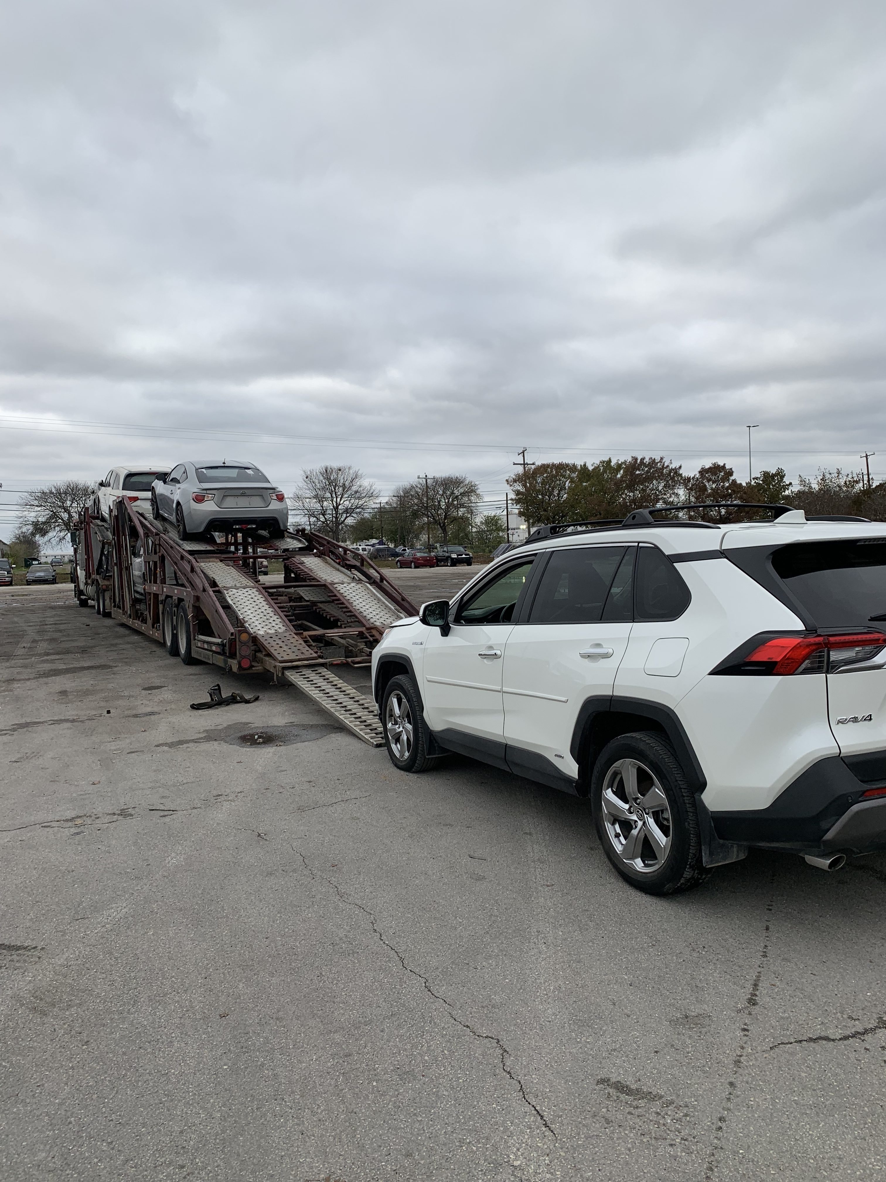 Loading the client's car on a truck in Spokane, WA Loading the client's car on a truck in Spokane, WA